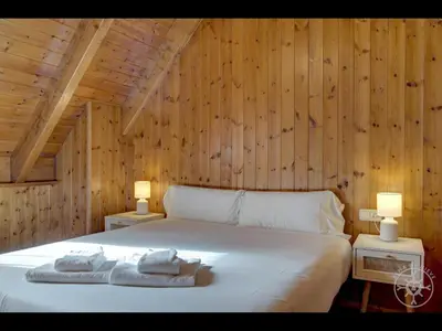 Cama o camas de una habitación en CASA TORDA de Alma de Nieve