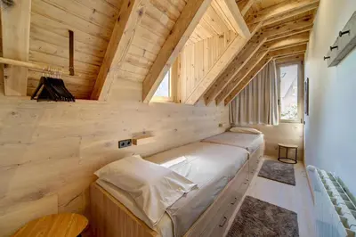 Cama o camas de una habitación en Tanau-Rentals El Oso