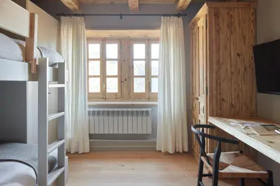 Una televisión o centro de entretenimiento en Pleta Baqueira Luxe 10 by FeelFree Rentals