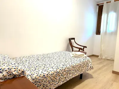 Cama o camas de una habitación en Apartament modern i cèntric Esterri by RURAL D'ÀNEU