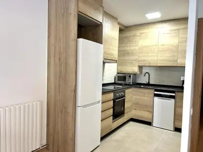 Una cocina o zona de cocina en Apartament cèntric amb terrassa i balcó by RURAL D'ÀNEU