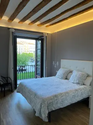 Cama o camas de una habitación en En el corazón de Pamplona