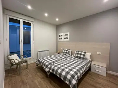Cama o camas de una habitación en En el corazón de Pamplona