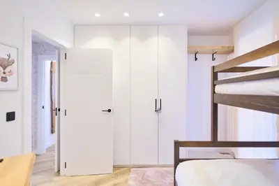 Cama o camas de una habitación en LUX Mountain con vistas y jacuzzi - Arafita Apartamentos