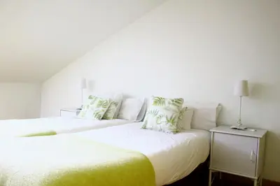 Cama o camas de una habitación en Aloha Apartamentos