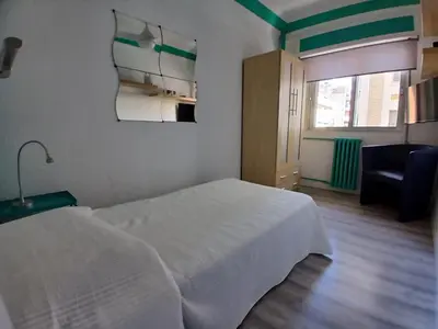 Cama o camas de una habitación en Piso recien reformado