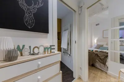 Cama o camas de una habitación en Center Pamplona Apartment UAT00537