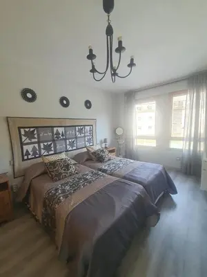 Cama o camas de una habitación en Somport bienvenidos a Canfranc Family