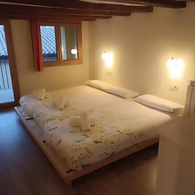 Cama o camas de una habitación en Ca la Mariana