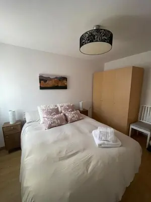 Cama o camas de una habitación en Apartamento Coqueto en El Pueyo, céntrico con WIFI