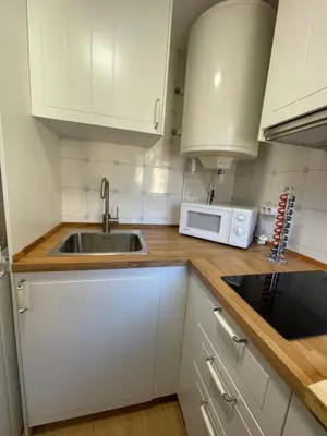 Una cocina o zona de cocina en Apartamento Coqueto en El Pueyo, céntrico con WIFI