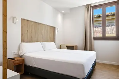 Cama o camas de una habitación en Iraipe Estella La Rúa Auto Check-in