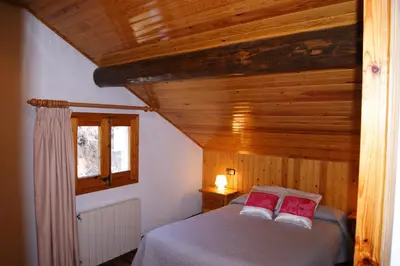 Cama o camas de una habitación en Apartaments Pont Romànic