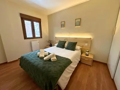 Cama o camas de una habitación en Apartamento Anayet: Formigal Centro