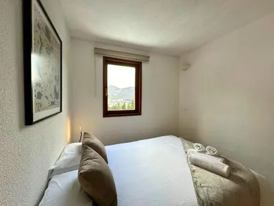 Cama o camas de una habitación en Cervino 2: Apartamento en Formigal Pueblo