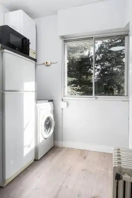 Una cocina o zona de cocina en Apto Pirenarium l CINE l Parking l Wifi l trastero