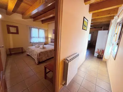 Cama o camas de una habitación en Apartamentos Casa Riu - Villmor