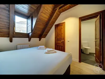 Cama o camas de una habitación en CASA ETH GARRET de Alma de Nieve
