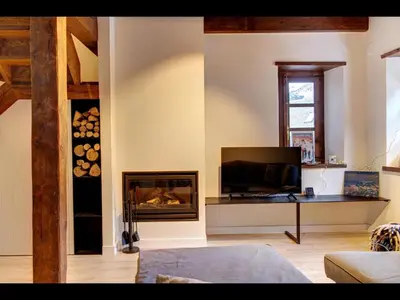 Una televisión o centro de entretenimiento en CASA ETH GARRET de Alma de Nieve
