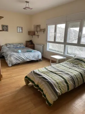 Cama o camas de una habitación en Casita Azul Homestay
