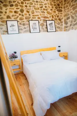 Cama o camas de una habitación en Bodega Ecológica - Rioja Suites