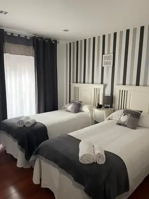 Cama o camas de una habitación en Apartamento Balcón a la Basílica del Pilar