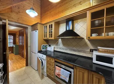 Una cocina o zona de cocina en CHECK-IN CASAS Arasan