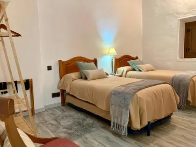 Cama o camas de una habitación en Cal Carlà de Belltall