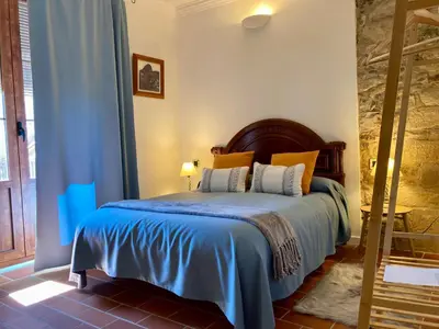 Cama o camas de una habitación en Cal Carlà de Belltall