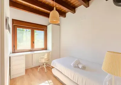 Cama o camas de una habitación en Casa Rural Orós