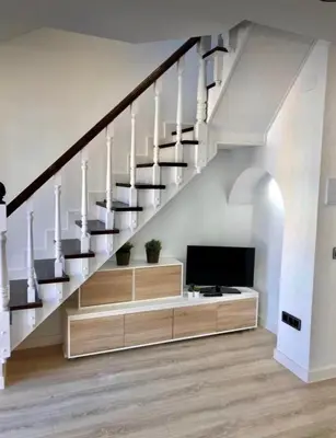 Una televisión o centro de entretenimiento en Apartamento Conde 3