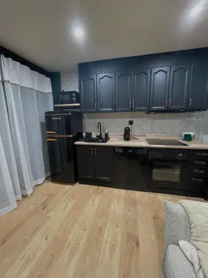Una cocina o zona de cocina en ENCANTADOR apartamento RENOS