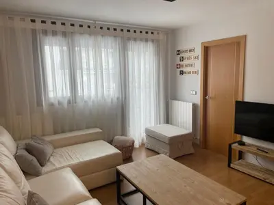 Una televisión o centro de entretenimiento en Apartamento Villanua centro