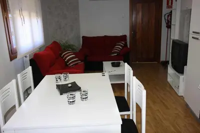 Una televisión o centro de entretenimiento en Apartamento Miralrio
