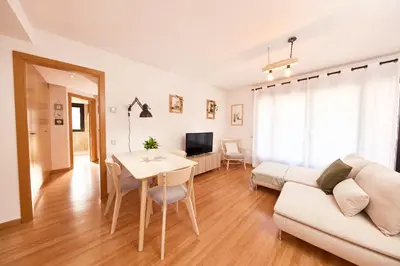 Una televisión o centro de entretenimiento en Apartamento Escalona Ordesa