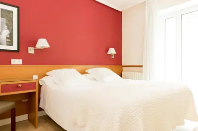Cama o camas de una habitación en Hotel Sauce