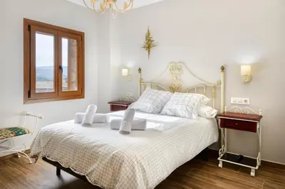 Cama o camas de una habitación en Estrella del Pirineo Castiello Jaca