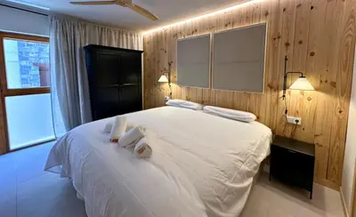 Cama o camas de una habitación en Foratata 22: Exclusivo refugio en Biescas