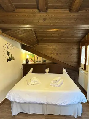 Cama o camas de una habitación en CA DEL SASTRET -Durro-
