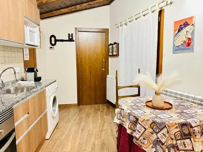 Una cocina o zona de cocina en CA DEL SASTRET -Durro-