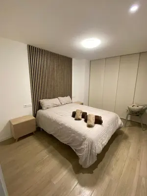 Cama o camas de una habitación en Acogedor rincón, a un paso del centro