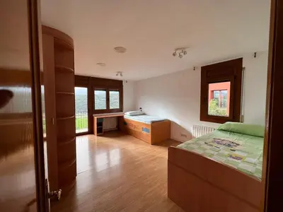 Cama o camas de una habitación en Casa en el Balcón del Pirineo