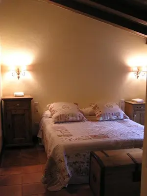 Cama o camas de una habitación en La Fabrica Casa Rural