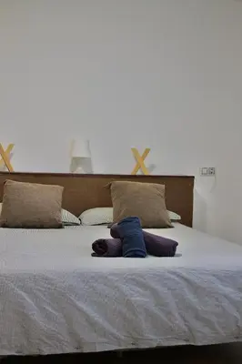 Cama o camas de una habitación en Villa Rosa Canfranc, tu refugio en el corazón del Pirineo Aragonés