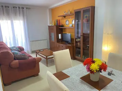 Una televisión o centro de entretenimiento en Apartamentos Alcañiz, Blanca