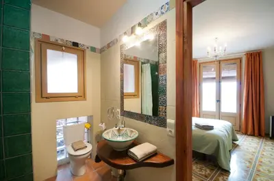 Cama o camas de una habitación en Palau de Miravet, casa monumento y galería de arte frente al río Ebro