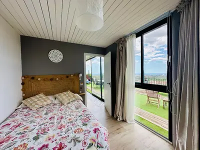 Cama o camas de una habitación en Home Mirador Castellvell