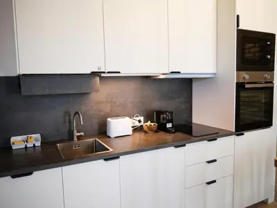 Una cocina o zona de cocina en Precioso ático con vistas en el centro de Pamplona