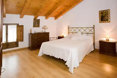 Cama o camas de una habitación en El Molino de la Hiedra