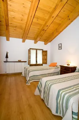 Cama o camas de una habitación en El Molino de la Hiedra